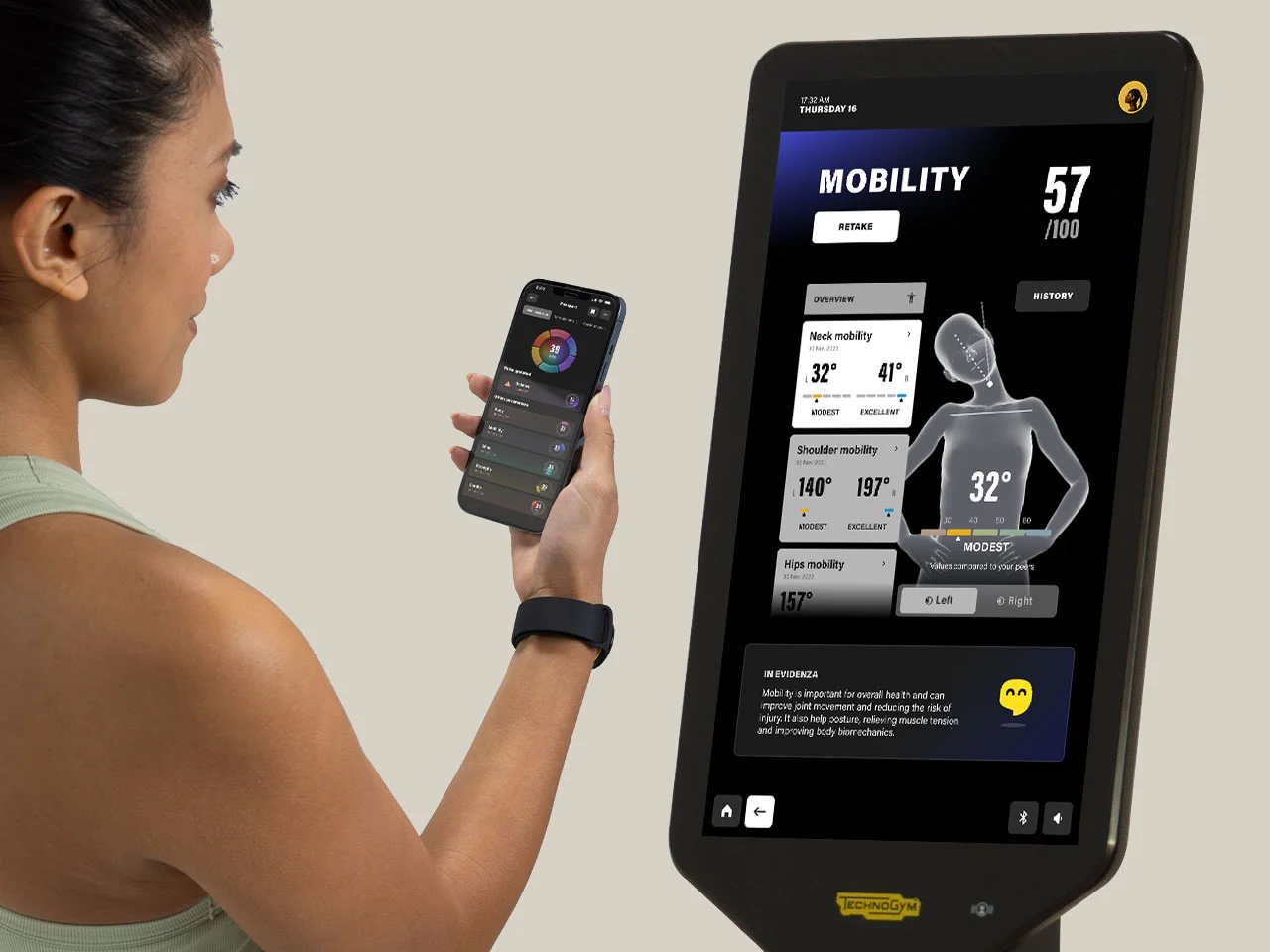 Woman using Technogym Checkup app with mobility assessment screen